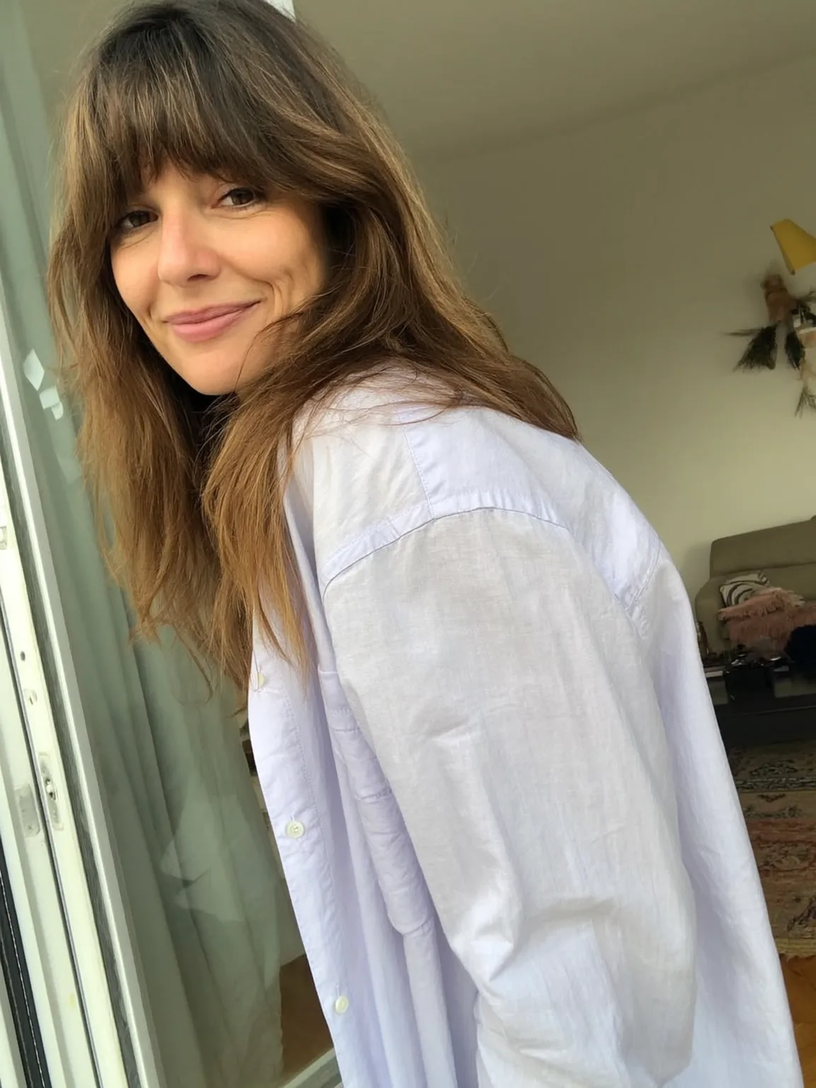 Medium Wavy Layers with Soft Curtain Bangs